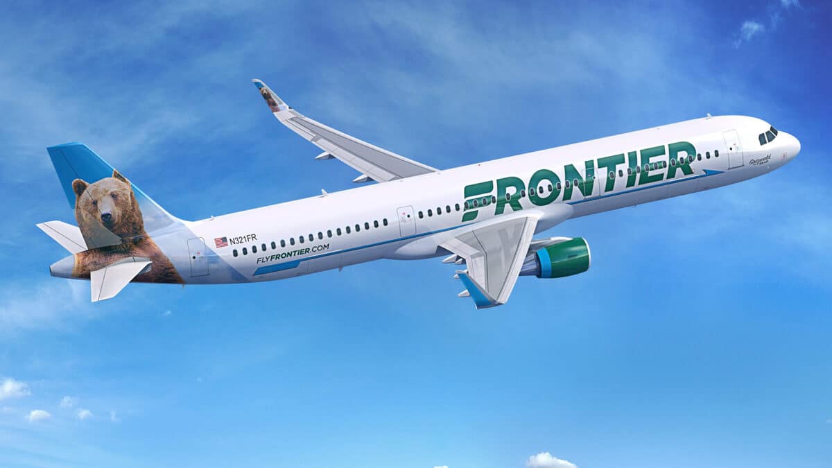 Frontier airplane flying in the sky