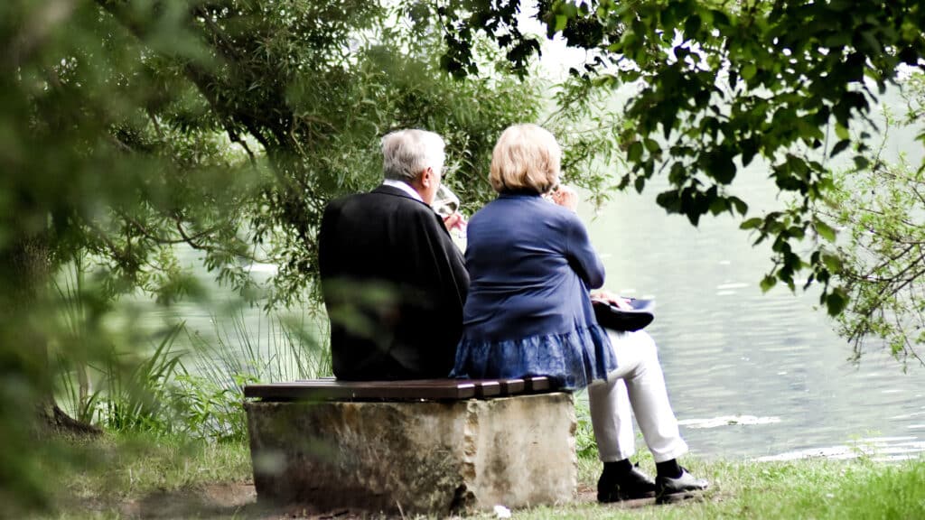 retired couple on bench