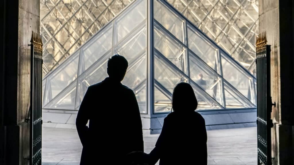 couple at The Louvre museum in Paris