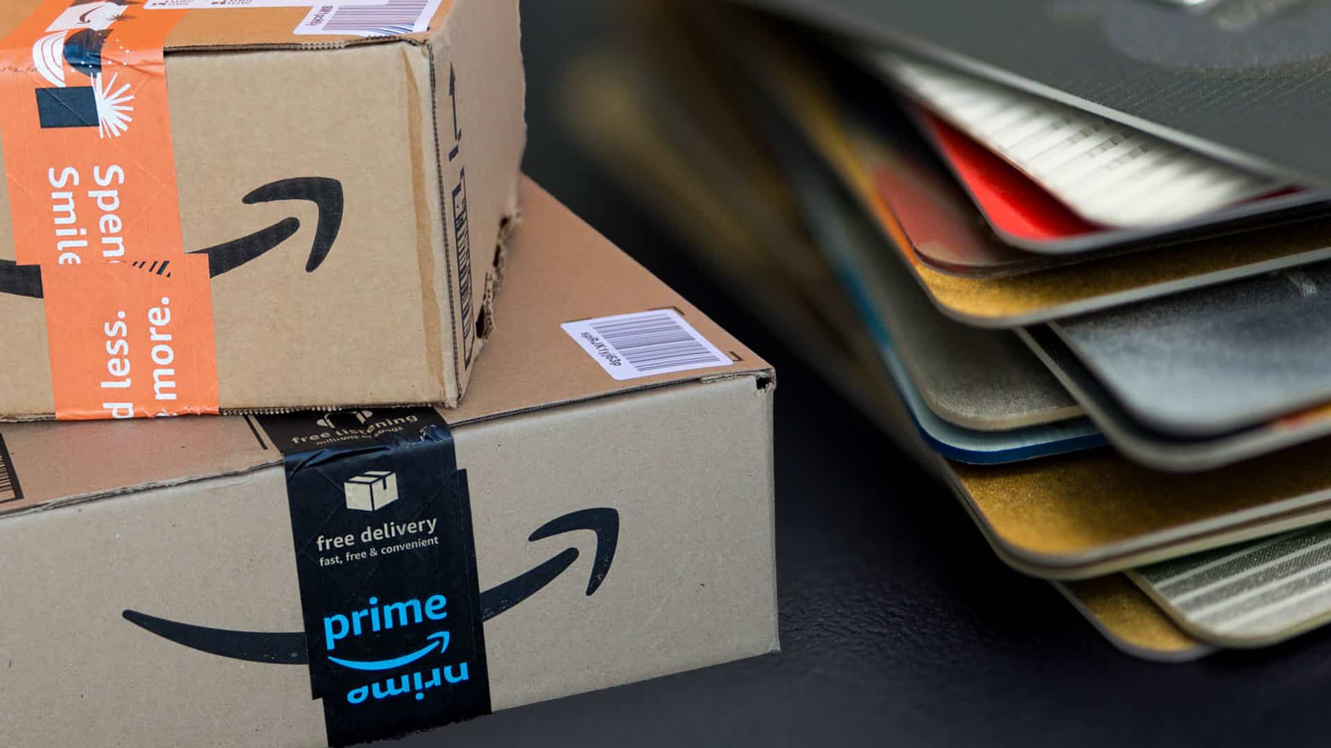 Amazon packages and a pile of gift cards