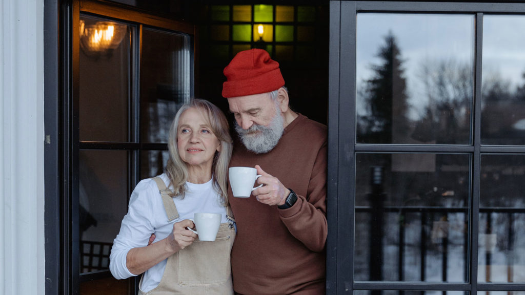 retired couple having coffee