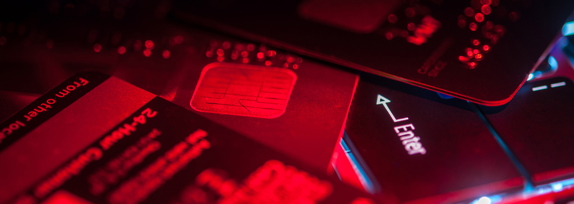 credit cards on computer with red light