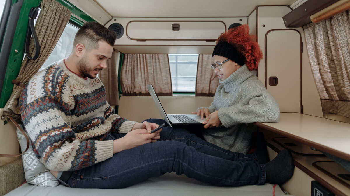 people in RV on computers