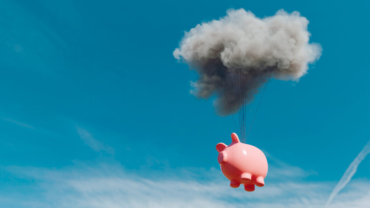 piggy bank floating under cloud