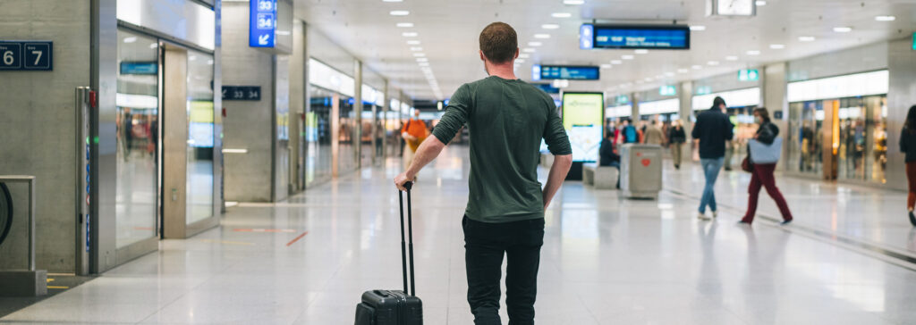 man standing in airport