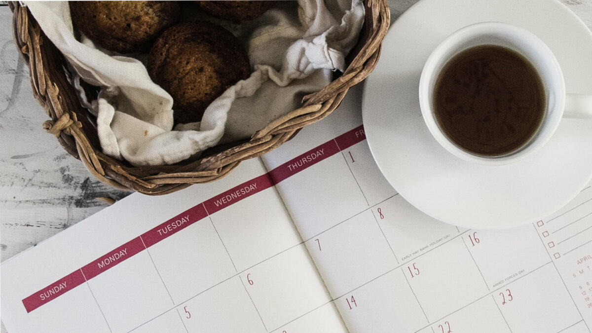 calendar on table with coffee