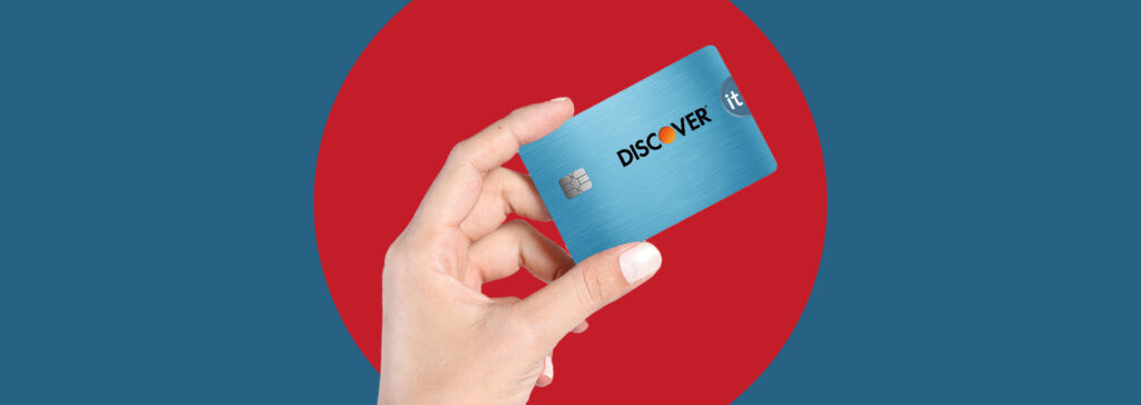 hand holding Discover card
