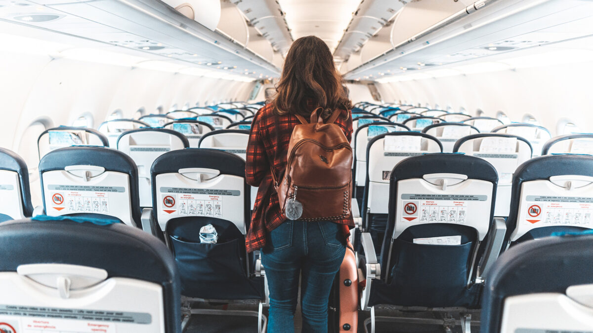 woman boarding airplane